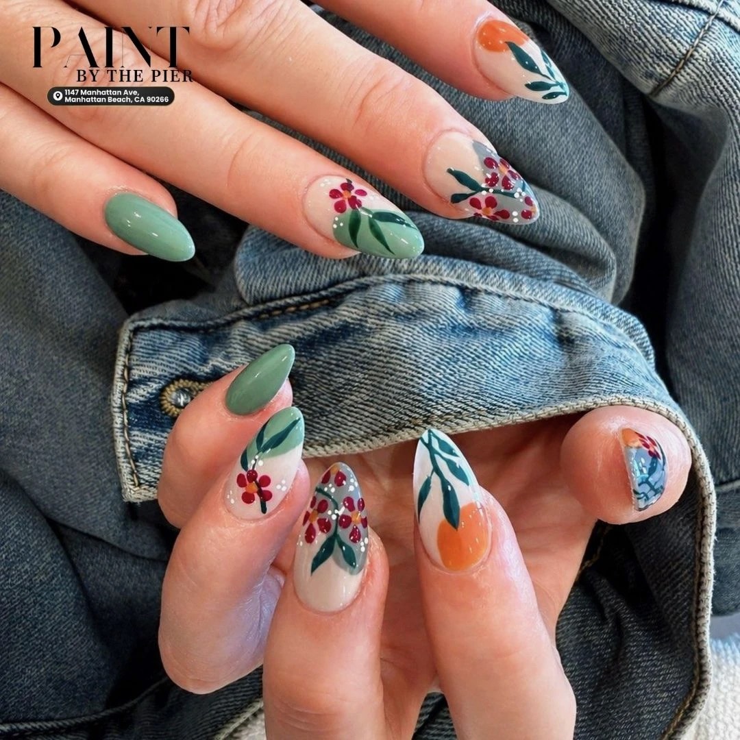 Sage green french tips with hand-painted mini floral nail art in Manhattan Beach CA
